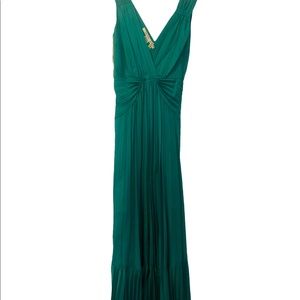 Beautiful DVF turquoise pleated dress. Size 2 but would fit 0-2. Worn once